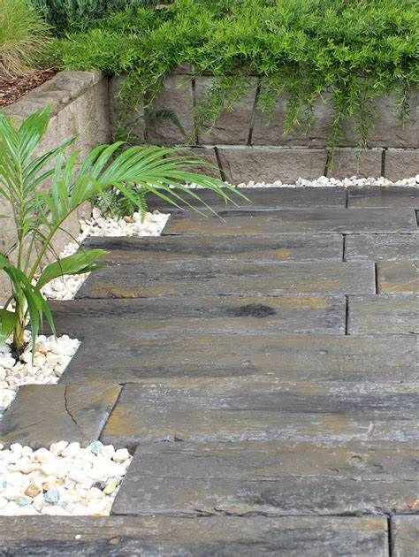 White quartz gravel around long stone pavers